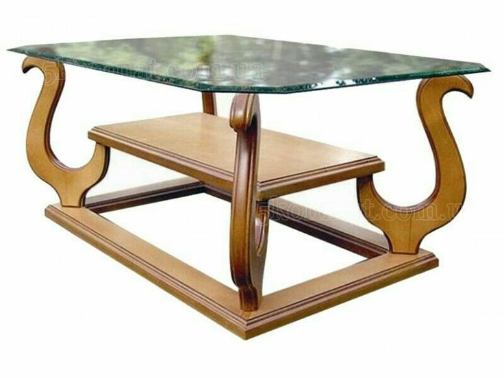 a wooden table with glass top and two legs on the bottom one shelf is made out of wood