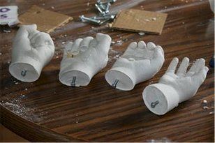 the hands are made out of white clay