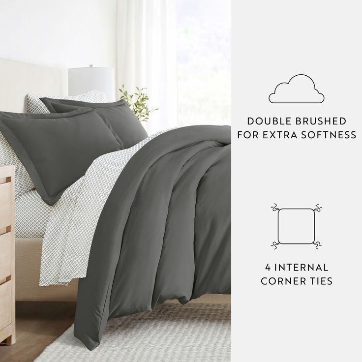 an image of a bedroom setting with grey bedding and comforter options for extra softness