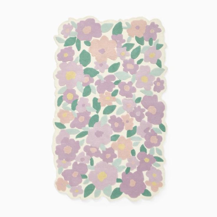 an image of a flowered rug on a white background with pink and purple flowers