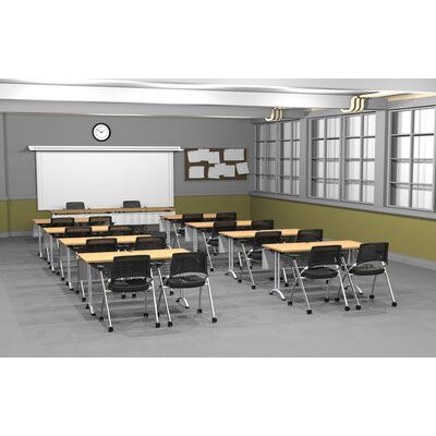 an empty classroom with desks and chairs