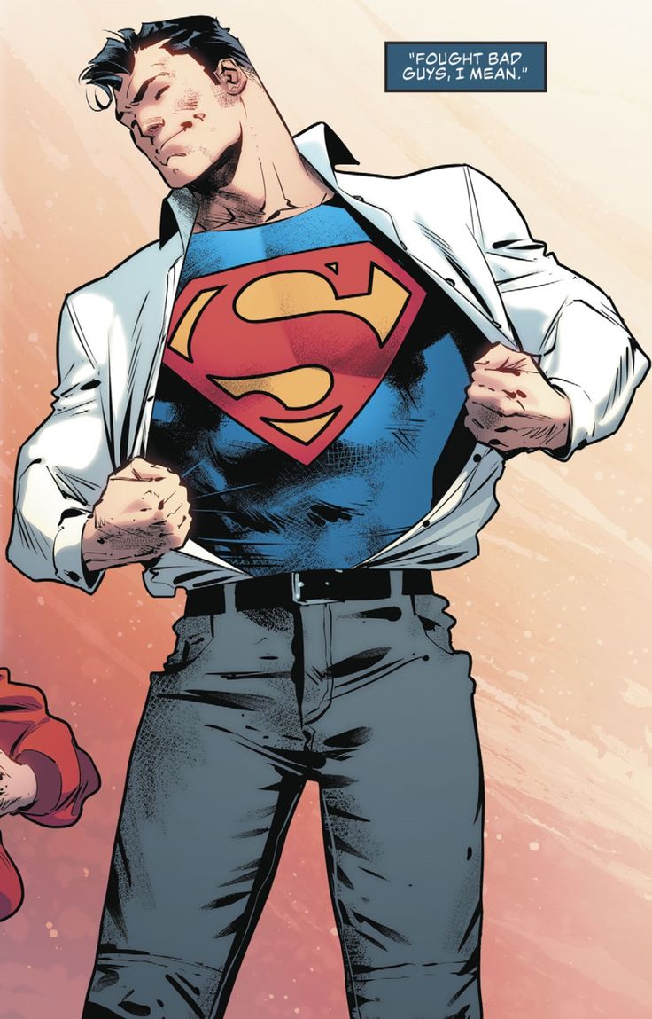 the man is wearing a superman t - shirt