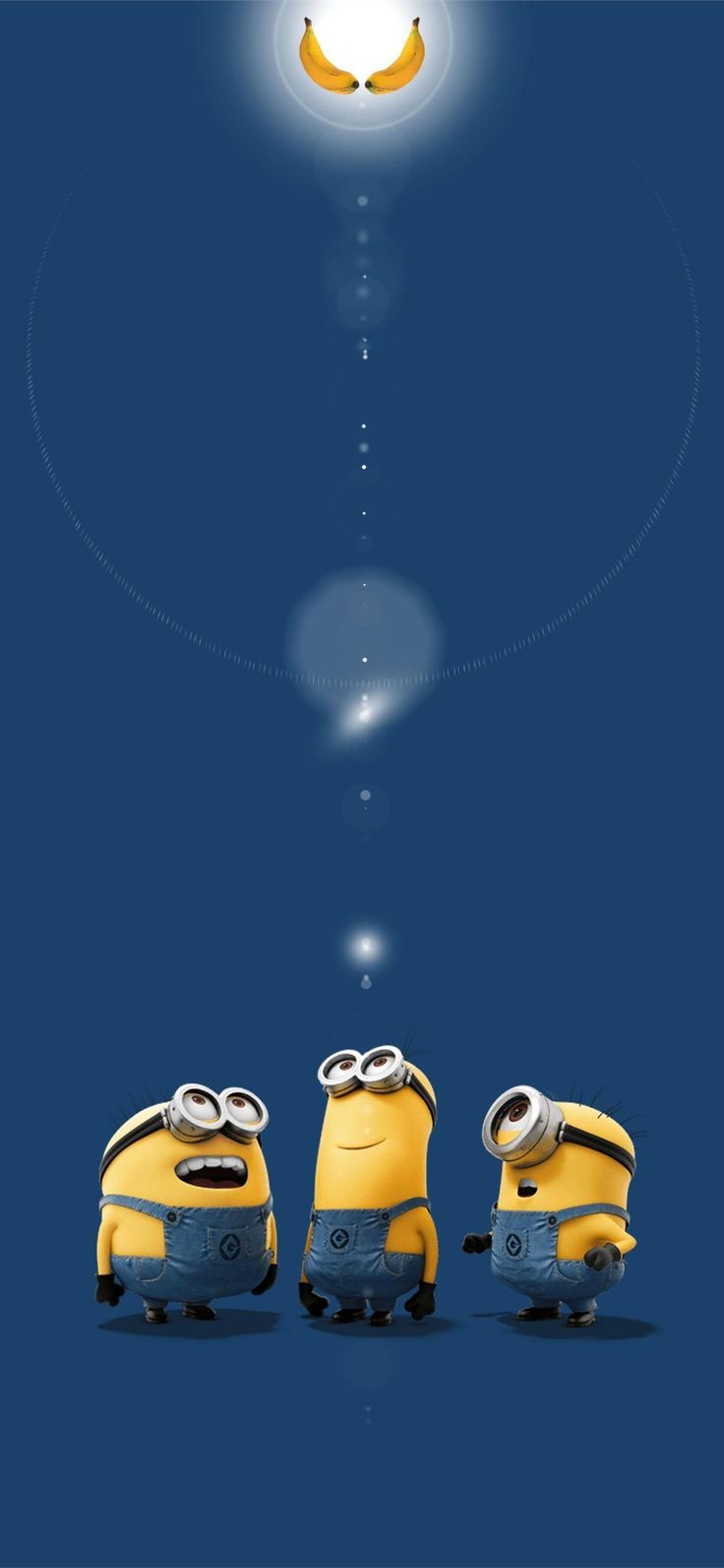 two minion characters are facing each other in front of the light that is above them