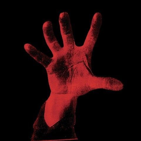 a red hand on a black background