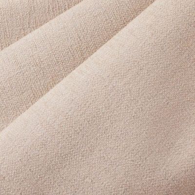 a close up view of a beige blanket