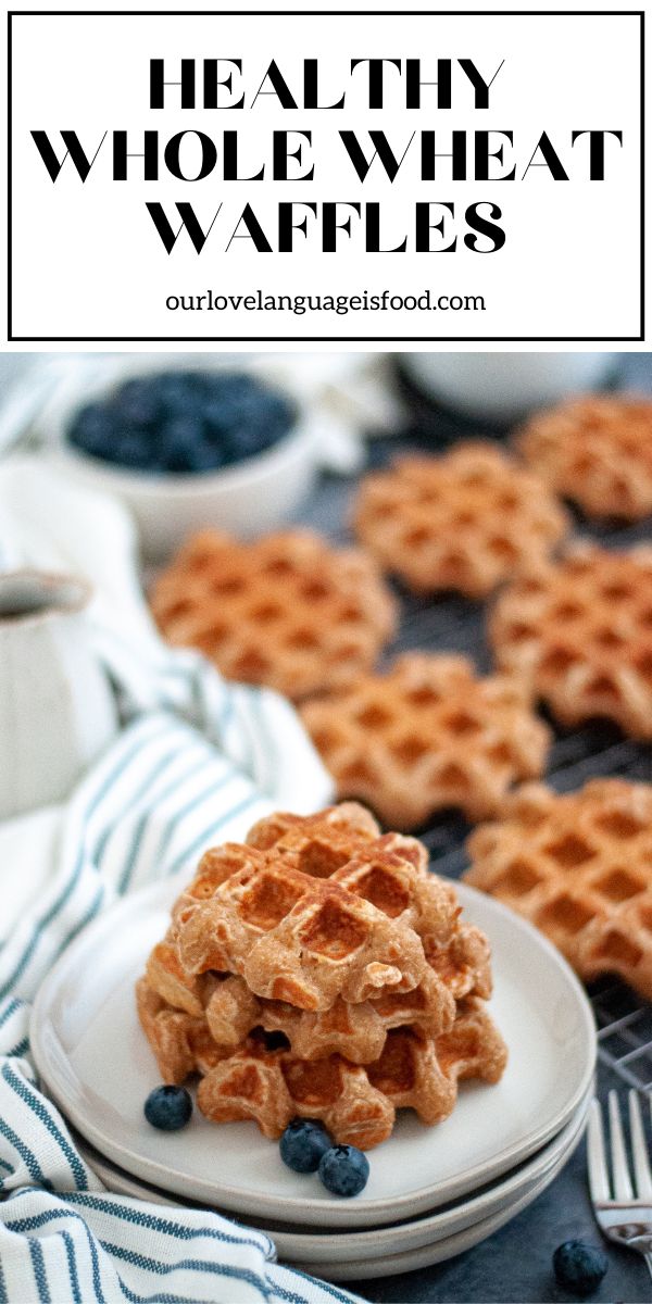 the best whole wheat waffles on a plate with blueberries