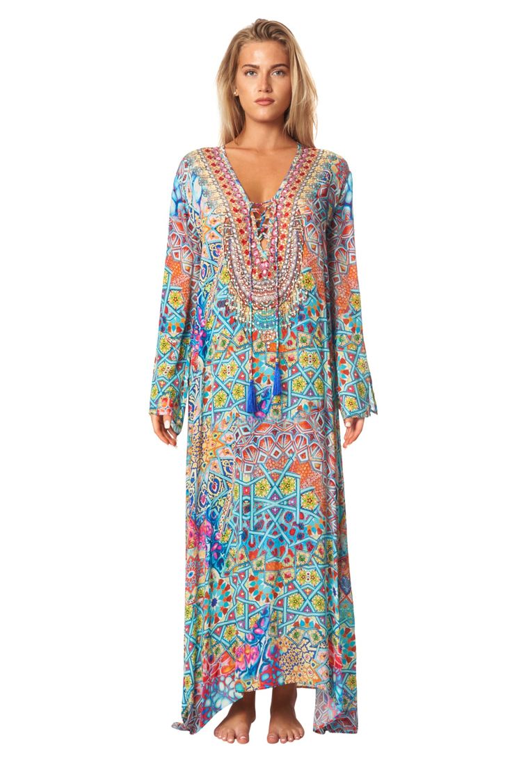 La Moda's trendy and effortless Day Dreamer Long Dress Boho Maxi Caftan can be worn as a gorgeous dress on its own or as the perfect cover-up for when you’re lounging poolside. The playful floral print in soft Viscose Silk fabric effortlessly add a touch of boho flair to any warm-weather look. Check more of La Moda's exclusive Shirred Maxi Dresses in beautiful Summer and Boho prints. High End Bohemian Resort Wear Wholesale. La Moda Bohemian Caftans are a flirty addition to your poolside ensemble Boho Print Maxi Kaftan For Beach Cover-up, Bohemian Kaftan With Boho Print For Beach Cover-up, Resort Beach Cover-up Maxi Length Kaftan, Multicolor Bohemian Maxi Length Cover-up, Bohemian Kaftan With Vibrant Print For Beach Cover-up, Boho Maxi, Beautiful Summer, Resort Wear, Silk Fabric