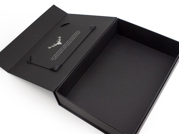 an open black box with a tag on it