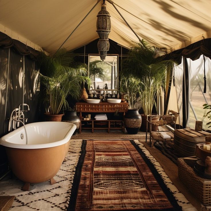 a bath tub sitting under a tent next to a table and chairs with potted plants on it