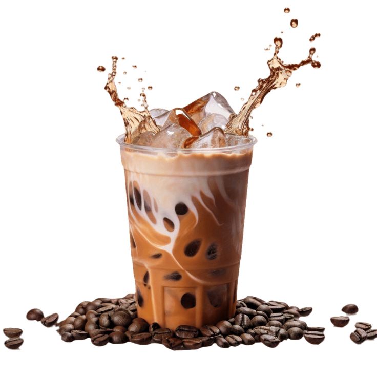 an iced coffee drink with ice and water splashing out of it on top of roasted coffee beans