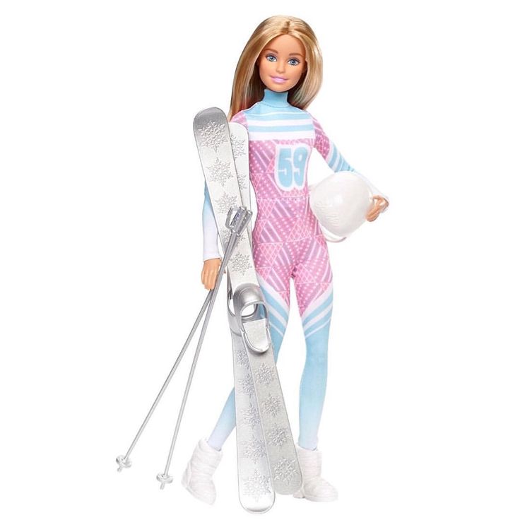 a barbie doll holding skis and a snowboard