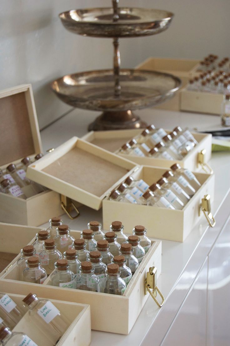 an assortment of bottles and trays on a table