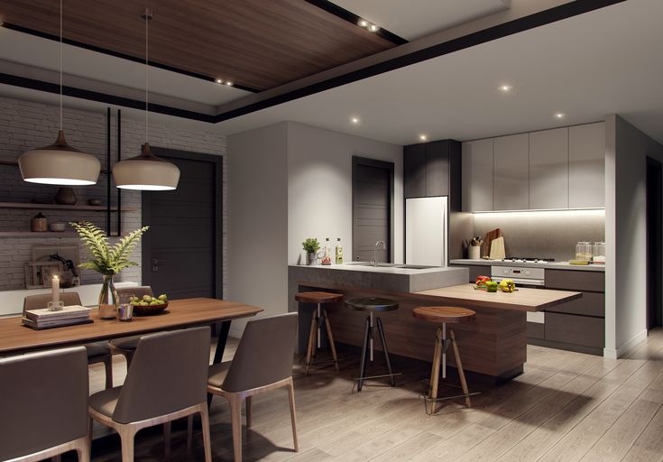 an open concept kitchen and dining room with wood flooring