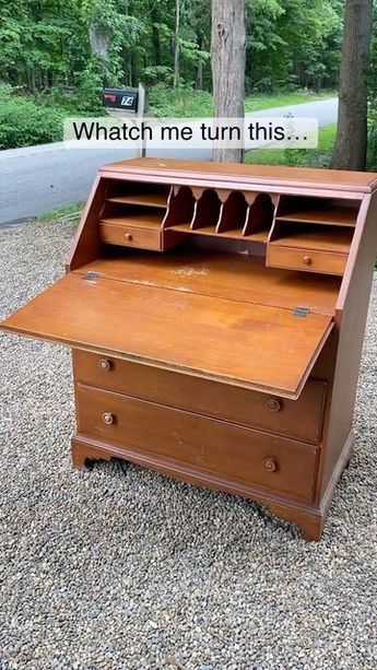 an old wooden desk with two drawers on it and the words watch me turn this