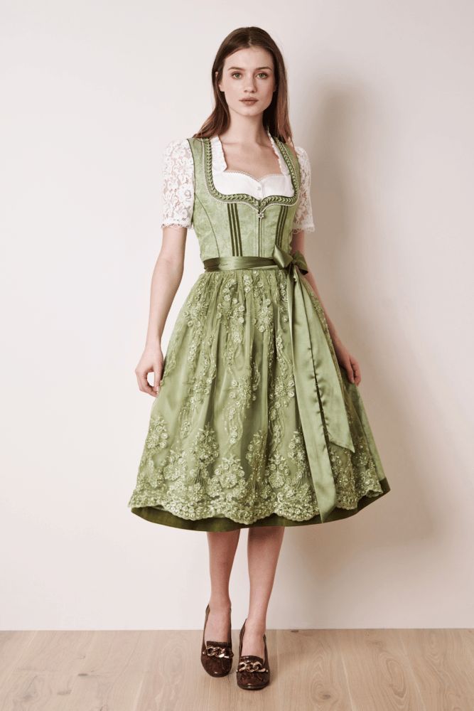 ITEM DESCRIPTIONThe elegant dirndl Gesia impresses with an embroidered apron on the ornament-rich dirndl dress. The delicate dirndl is rounded off by its pearl-embroidered neckline and a special zipper puller.The model is 1.72 m tall and is wearing the dirndl with a skirt length of 70 cm in this photo.DETAILS & EXTRASItem No. 111065-7-0051Color greenSweetheart NecklineClosure zip at frontScope of delivery Dirndl blouse and accessories are not included in the price.Pockets Two side pockets in the Dirndl Dress Traditional, Traditional German Clothing, Drindl Dress, German Traditional Dress, Oktoberfest Outfits, German Dress Dirndl, Germany Fashion, German Outfit, German Dress