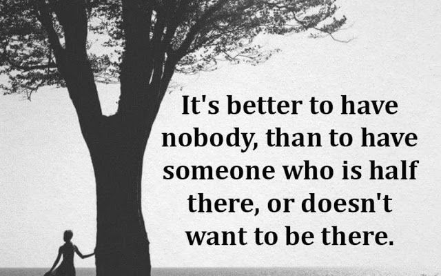 a woman standing next to a tree with the quote it's better to have nobody than to have someone who is half there, or doesn't want to be there