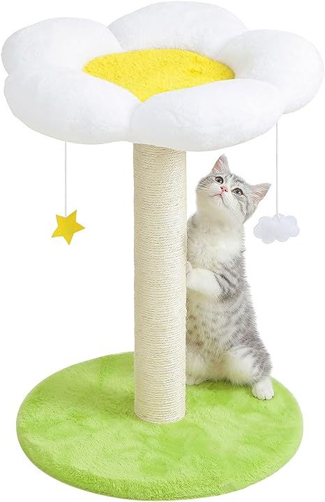 a cat is playing with a toy in the shape of a flower on top of a tree