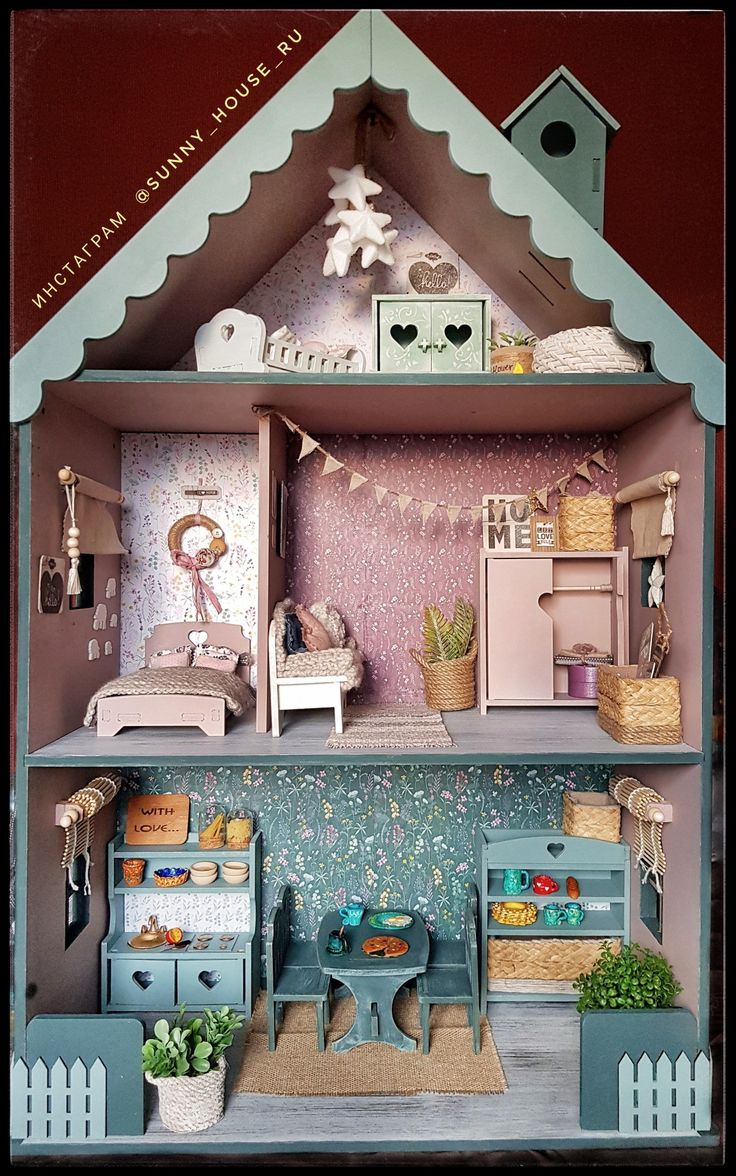 a doll house with furniture and accessories in the interior, as well as decorations on the outside