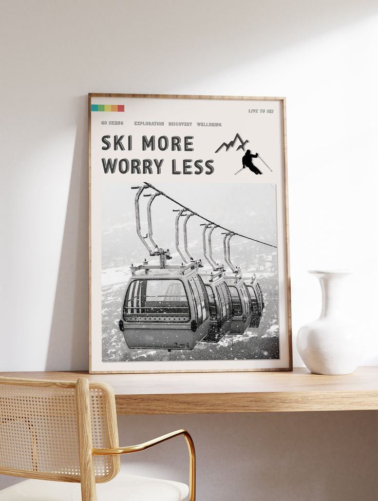 there is a ski lift poster on the wall