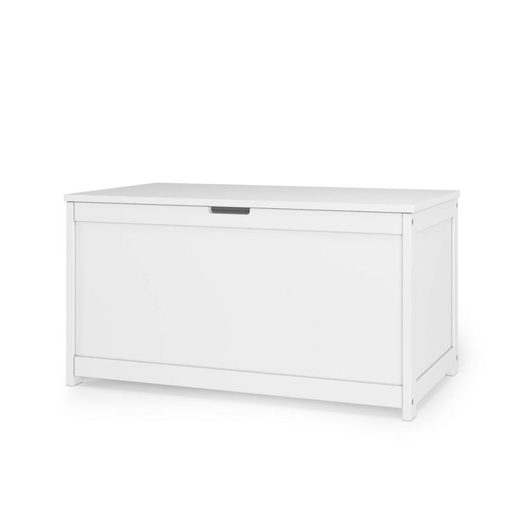 a white chest with drawers on the top and bottom, in front of a white background