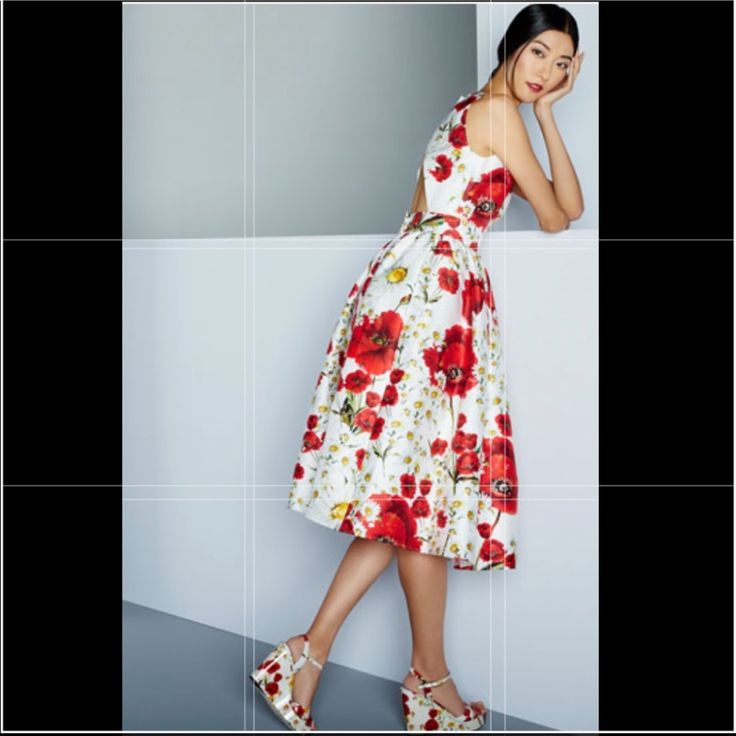 Join The Celebrities Wear The Gorgeous Dolce And Gabbana 2016 Poppy Print Midi Length Dress To Your Every Occasion. Description Dolce And Gabbana Poppy A-Line Dress From The Spring 2016 Collection White And Red Floral Print Sleeveless With Scoop Neck Concealed Zip Closure At Back Measurements: Bust: 33" Waist: 27” Hip: 36" Length: 43" Fabric: 86% Cotton, 14% Silk; Lining 100% Cotton Condition Is "Pre-Owned" - Very Good. Please Ask Questions Before Making Your Offer. All Sales Are Final ! Red Floral Dress For Party, Red Feminine Floral Dress For Garden Party, Red Feminine Dress For Garden Party, Feminine Red Dress For Garden Party, Red Floral Dress For Garden Party, White Floral Midi Length Dress, Chic White A-line Floral Dress, White Floral Print Cocktail Dress, Chic Red Floral Dress