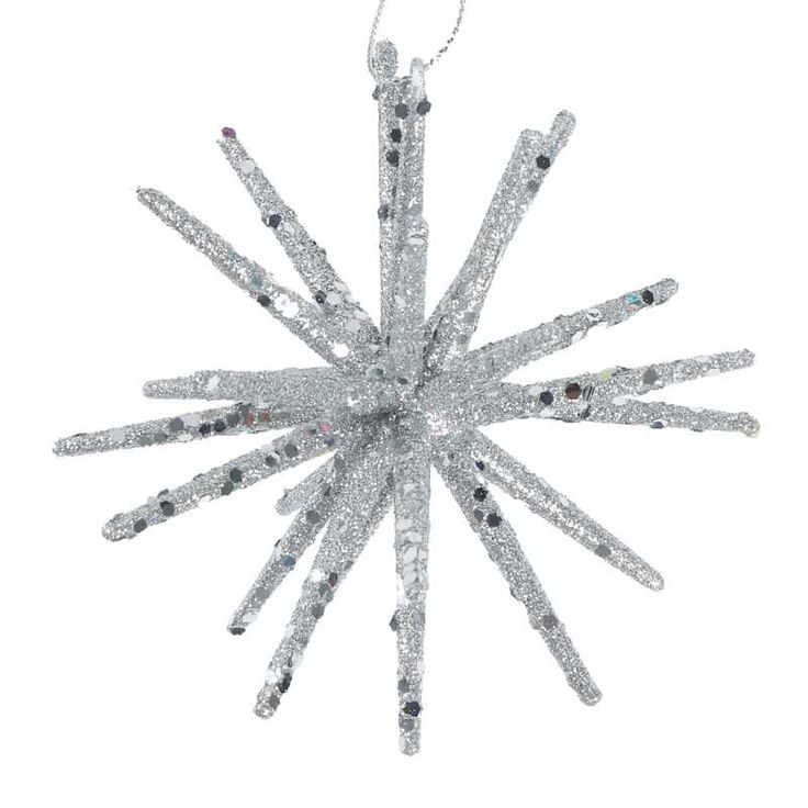 an ornament shaped like a snowflake with lots of sparkles on it