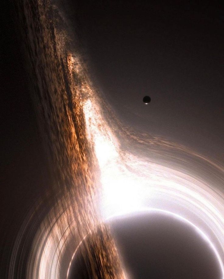 an image of a black hole in the sky with light coming from it and a distant object nearby