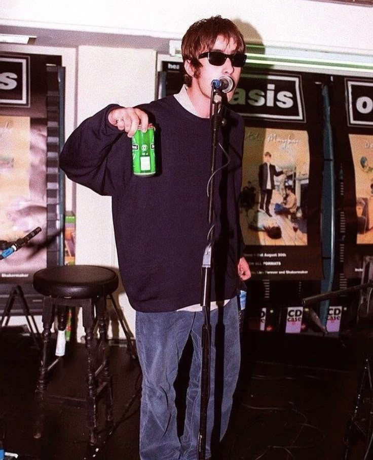 a man standing in front of a microphone