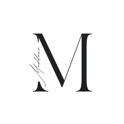 the letter m is inscribed in cursive handwriting