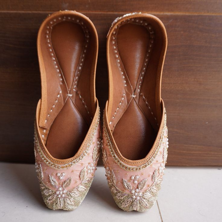 30% OFF on all items and get 10% EXTRA Discount on Purchase THREE or MORE items COUPON CODE-UPBEATSAVINGS . Handmade Jutti Size:- US closure:- pull on Color:- Peach Material:- Leather Made:- Handmade Sole:- Leather Can Be Personalized:- Yes Crafted with exquisite artistry and cultural richness, our bridal shoes collection on Etsy embodies the timeless elegance of Indian traditional footwear. From Punjabi Juttis to bejeweled masterpieces, our range showcases an array of stunning designs perfect f Wedding Heels With Leather Sole And Closed Toe, Leather Wedding Heels With Leather Sole, Wedding Heels With Leather Sole And Round Toe, Festive Handwork Leather Flats, Elegant Handwork Flats, Traditional Closed Toe Leather Heels, Traditional Leather Closed Toe Heels, Festive Leather Flats With Handwork, Festive Formal Slip-on Flats