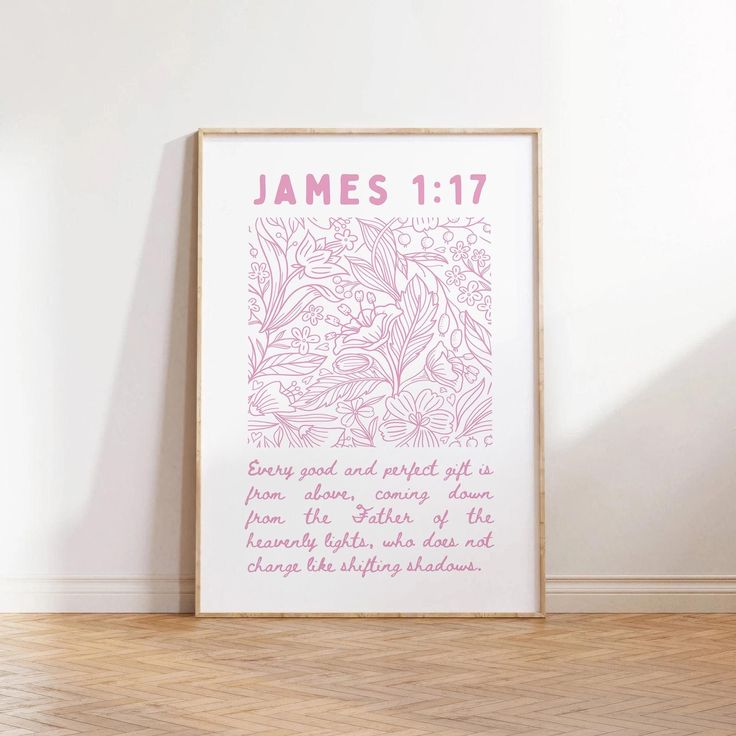 a pink poster with the words james 11 17 on it in front of a white wall