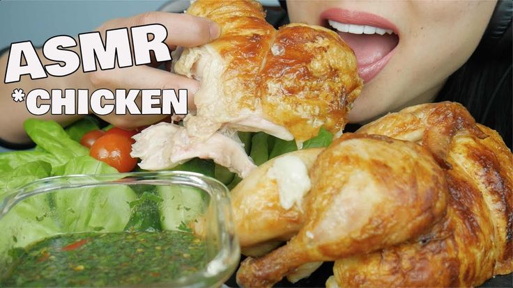 a woman is eating some food with her face close to the camera and text asmr chicken