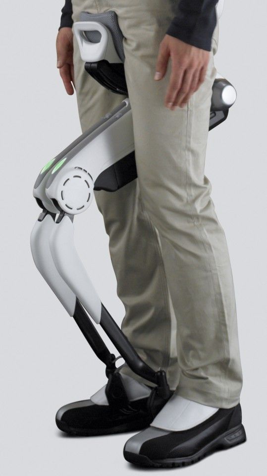 a person standing with their foot on a device attached to the back of his pants