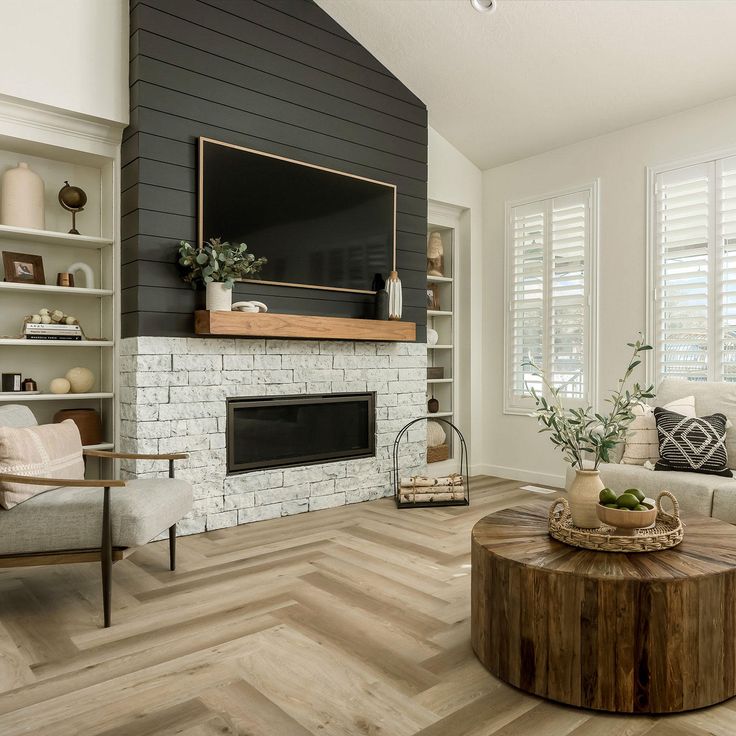 the living room is clean and ready to be used as an office or family room