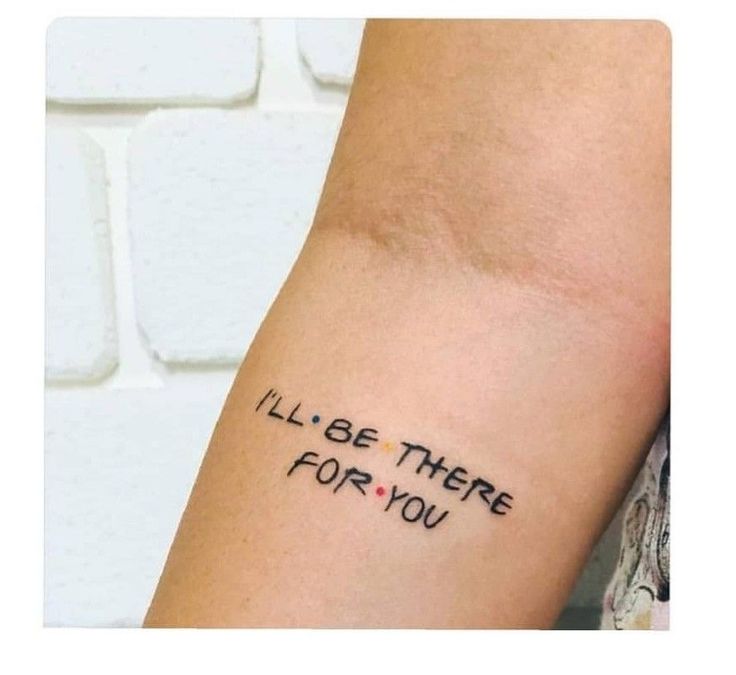 a woman with a tattoo on her arm that says i'll be there for you