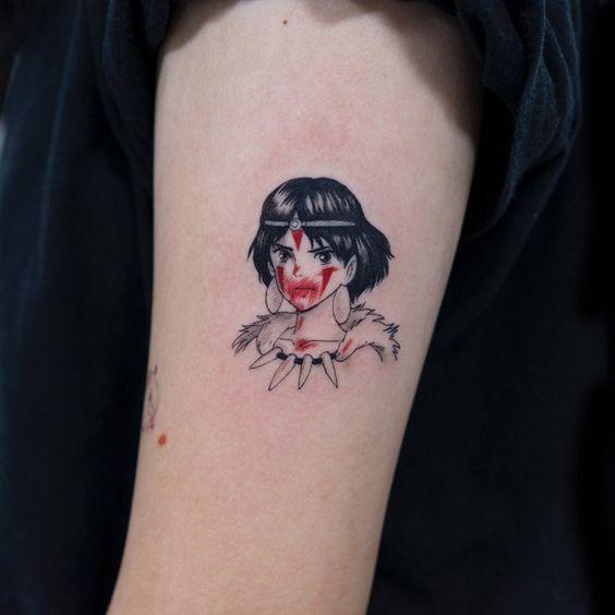 a woman's arm with a tattoo on it that has a drawing of a girl