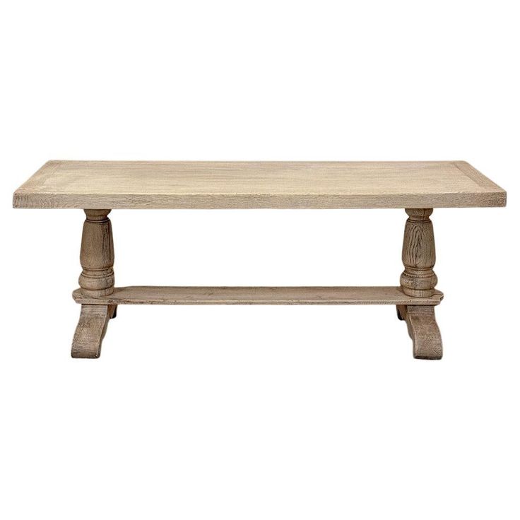 an old wooden table on a white background