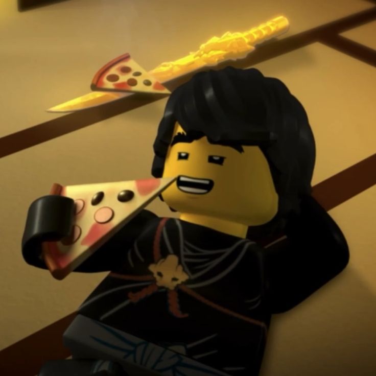 a lego man holding a slice of pizza