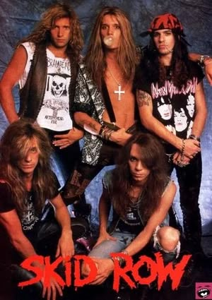 the band skid row posing for a photo