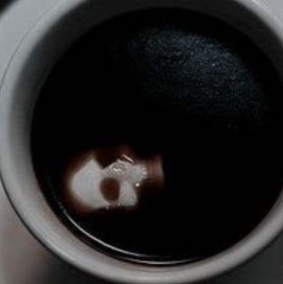 the inside of a coffee mug with water in it