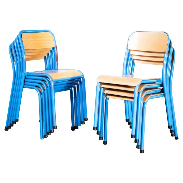 four blue chairs with wooden seats on each side and one chair in the middle, all stacked up