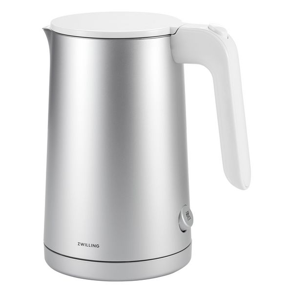 a stainless steel electric kettle on a white background