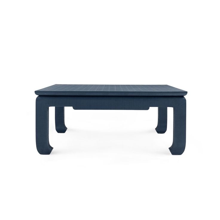 a blue coffee table sitting on top of a white floor