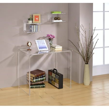 a clear glass shelf with books on it and a vase full of flowers next to it