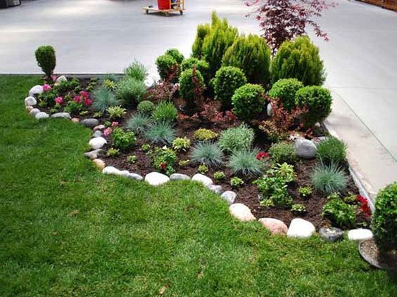 a garden in the middle of a driveway