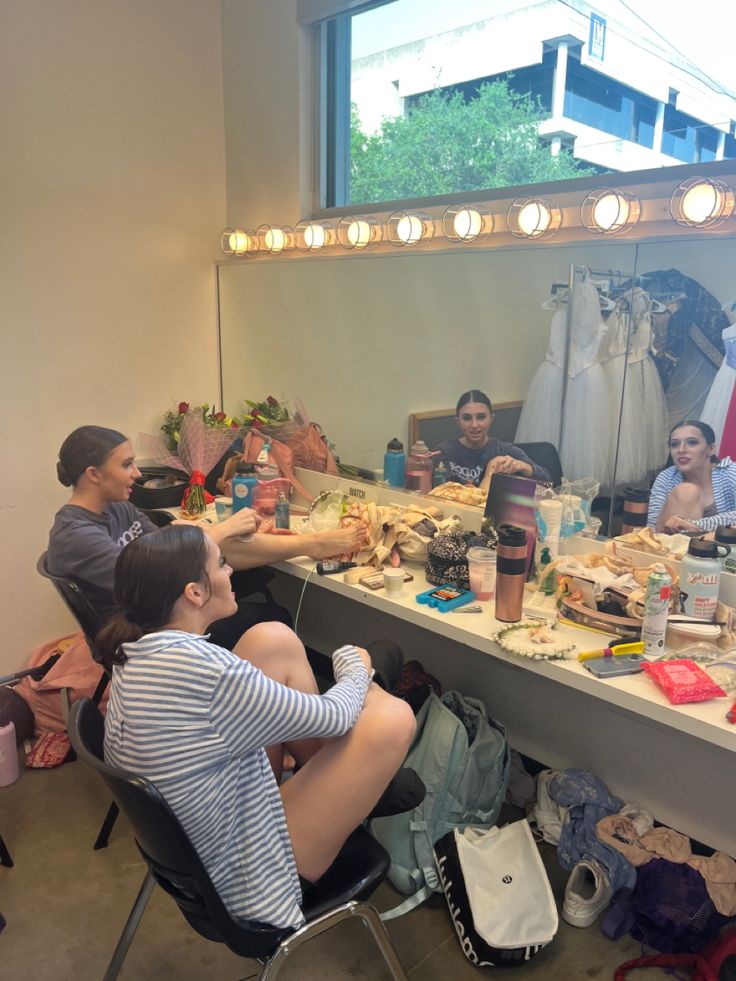 a group of people sitting around a table