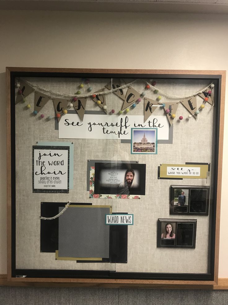 a bulletin board with pictures and magnets attached to it's sides, hanging on the wall