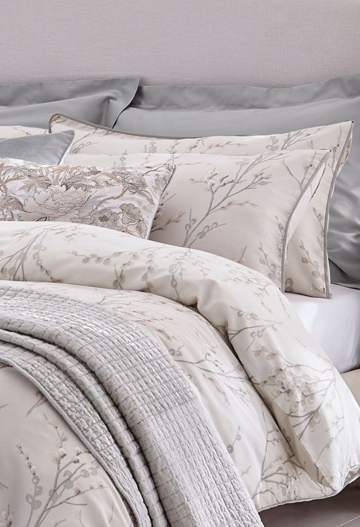 the comforter is neatly made and ready to be used in this bedding set