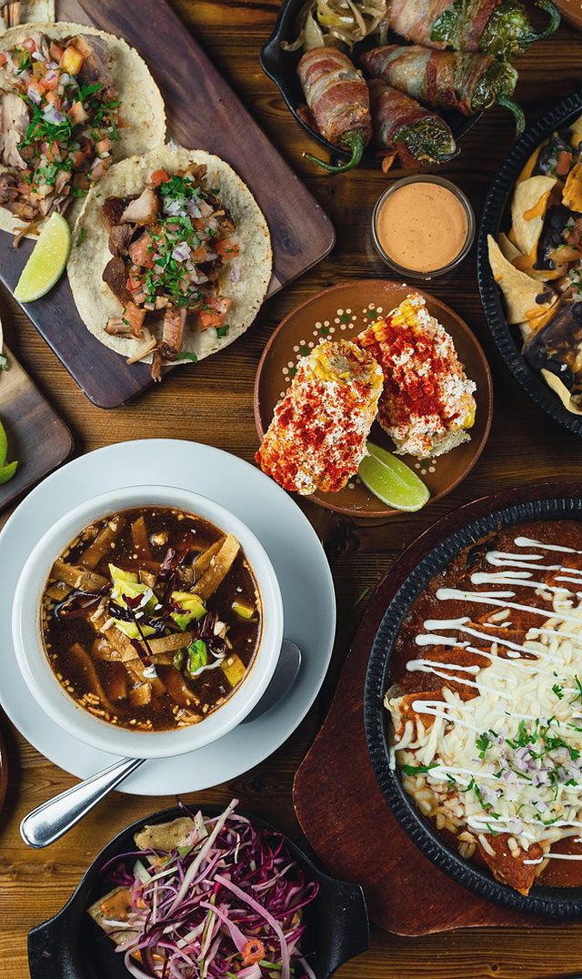 a table topped with lots of different types of food