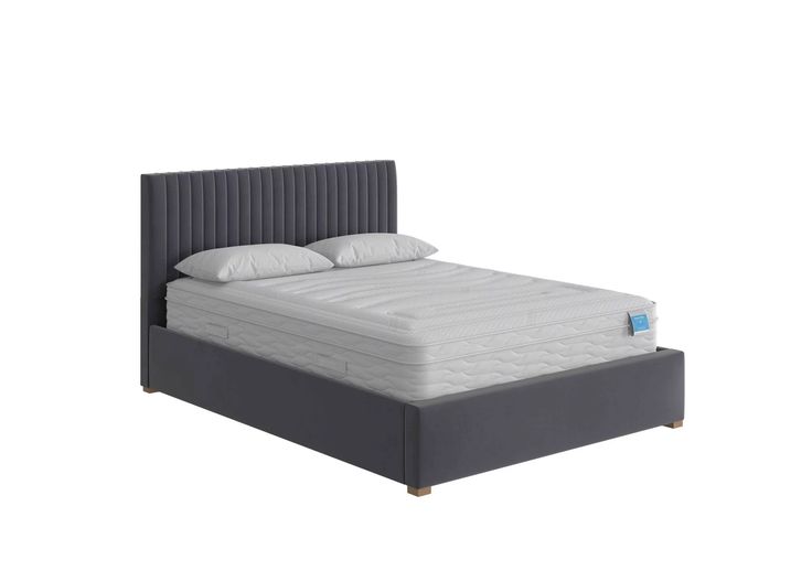 an image of a bed with mattress and headboard